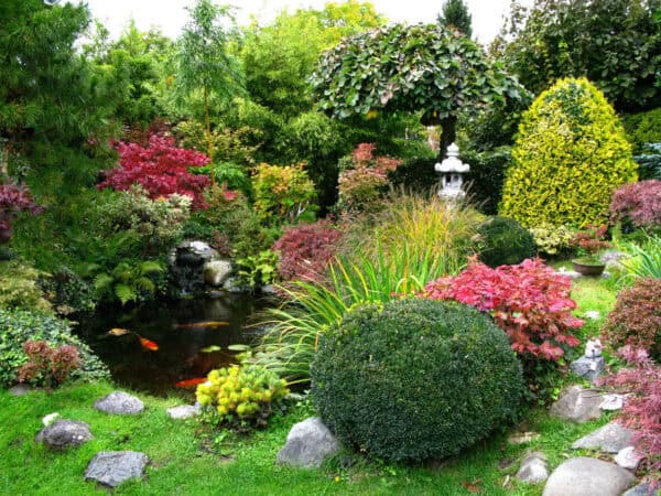 A garden with cremation garden stones and sculpture