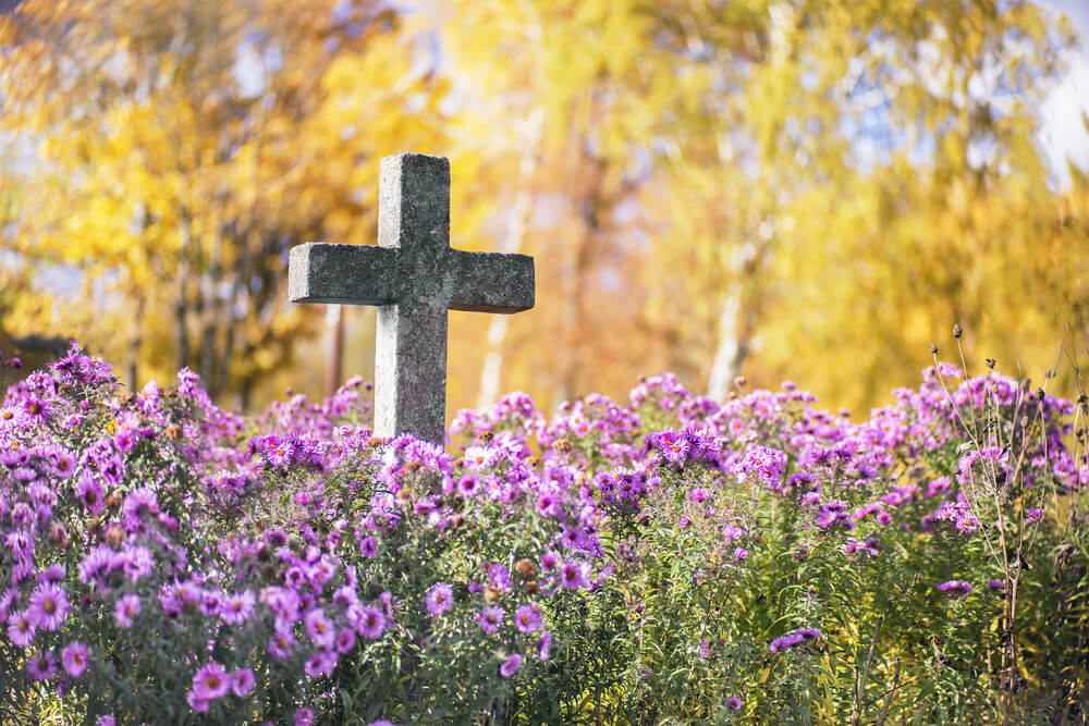 previously the church forbade cremation - burial in Catholic cemetery.