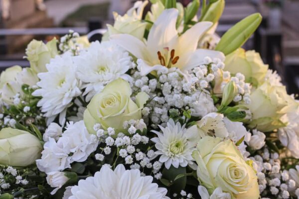 Funeral home staff will arrange flowers for the service.