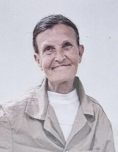 An older woman smiles gently, representing Alabama funeral and cremation services.
